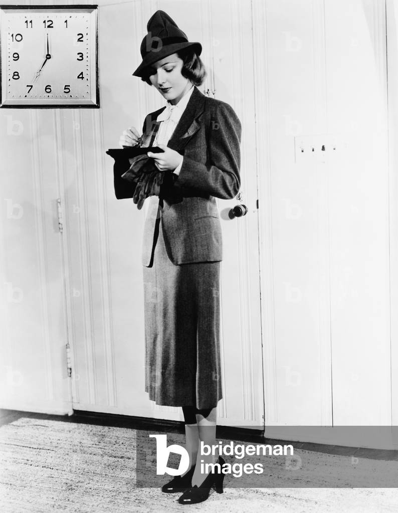 Young Woman Checking her Purse