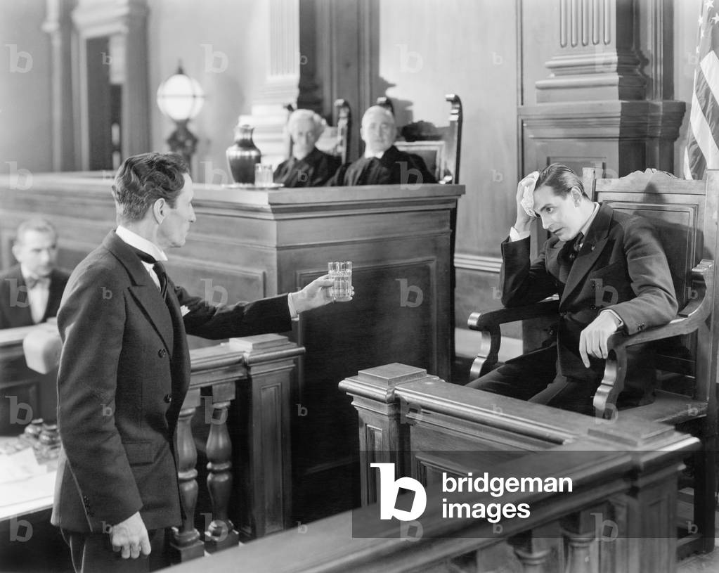 Lawyer and a Witness in a Courtroom