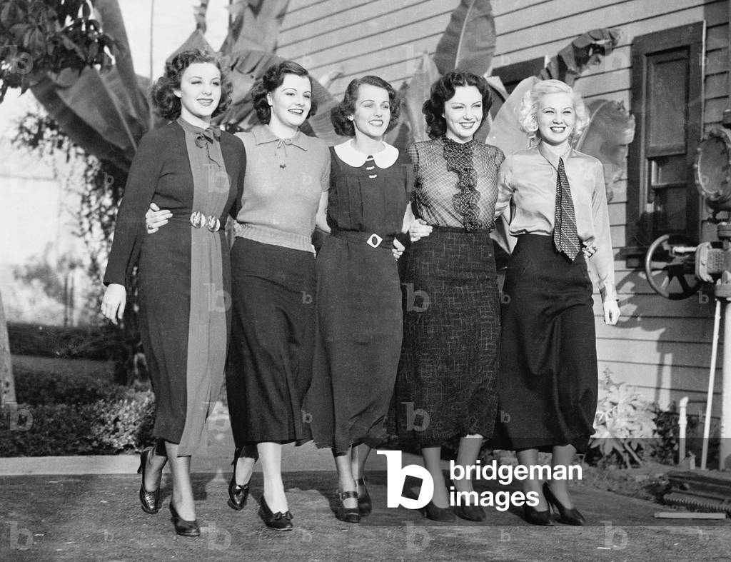 Five Women Posing in a Back Yard