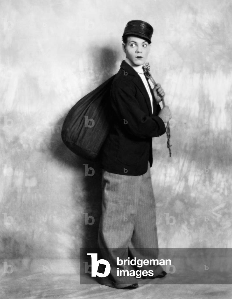 Woman Dressed As Laundry Man