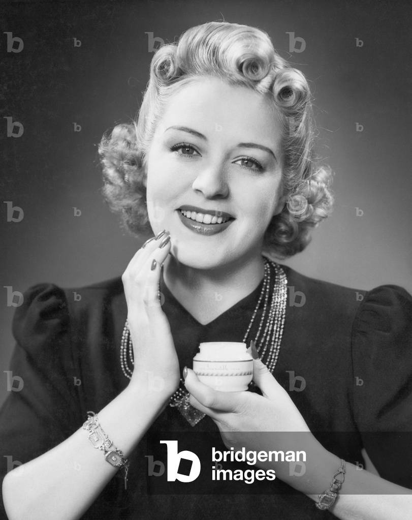 Portrait of Woman Applying Makeup