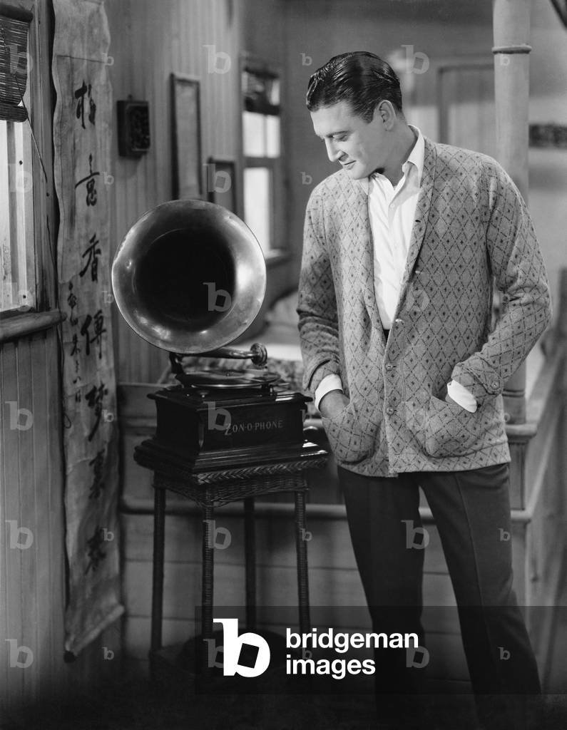 Man Listening to Phonograph