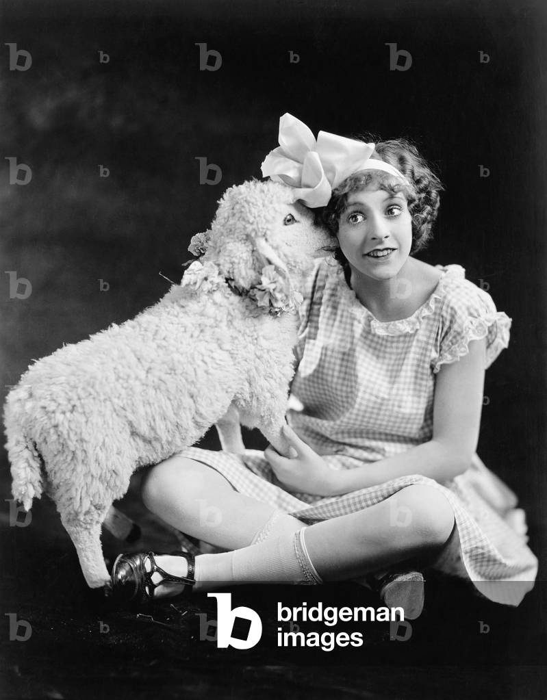 Lamb Whispering Into a Teenager's Ear
