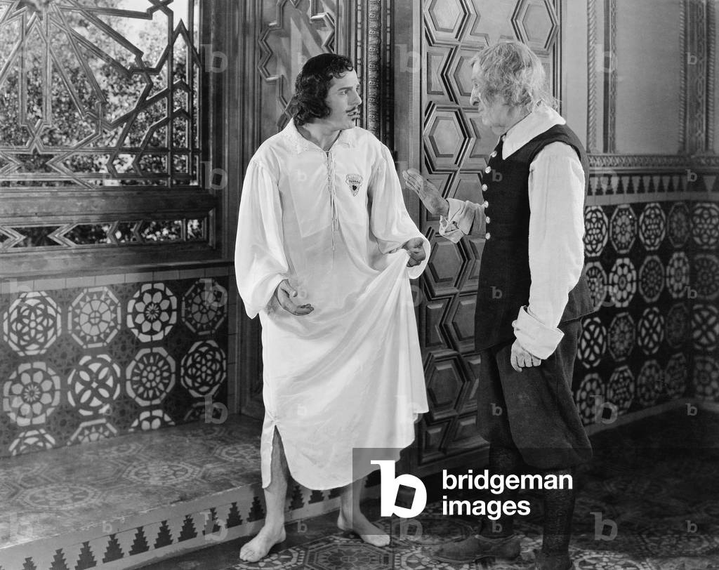 Man in a Nightgown Arguing with a Man in the Hallway