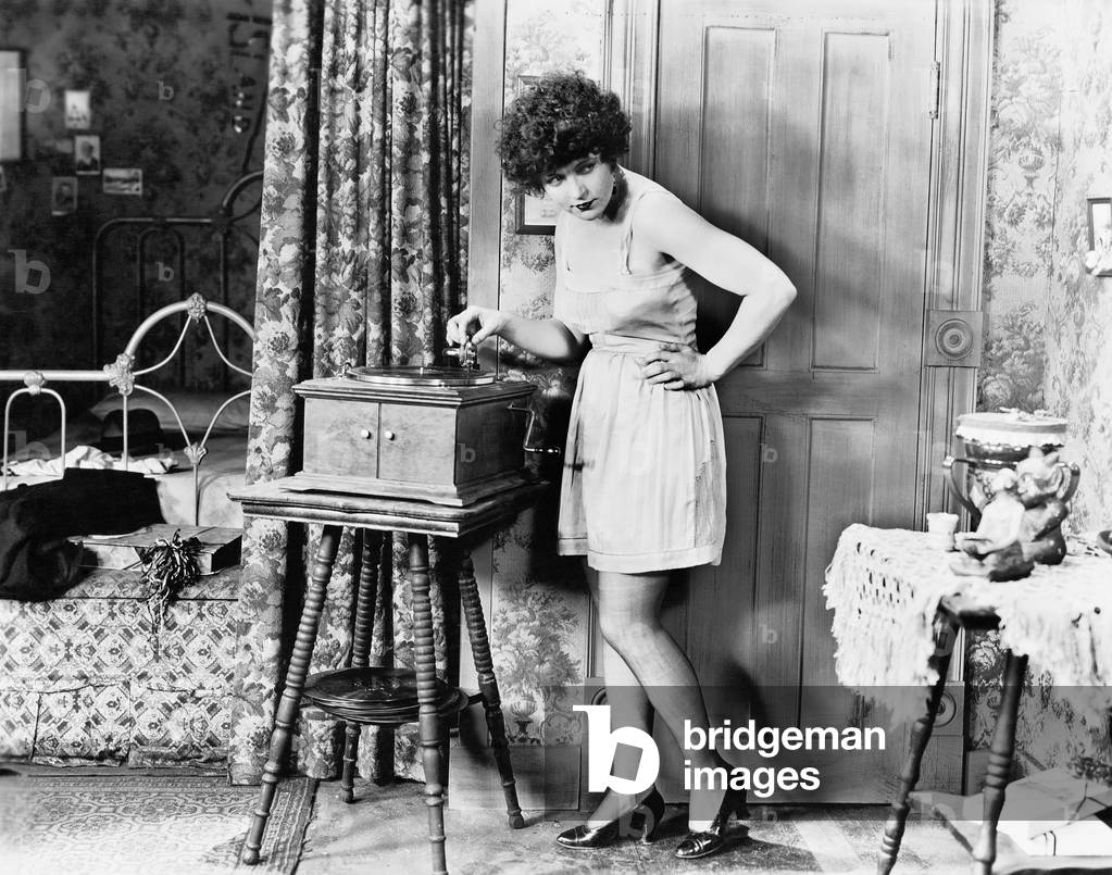 Woman Playing Record Player