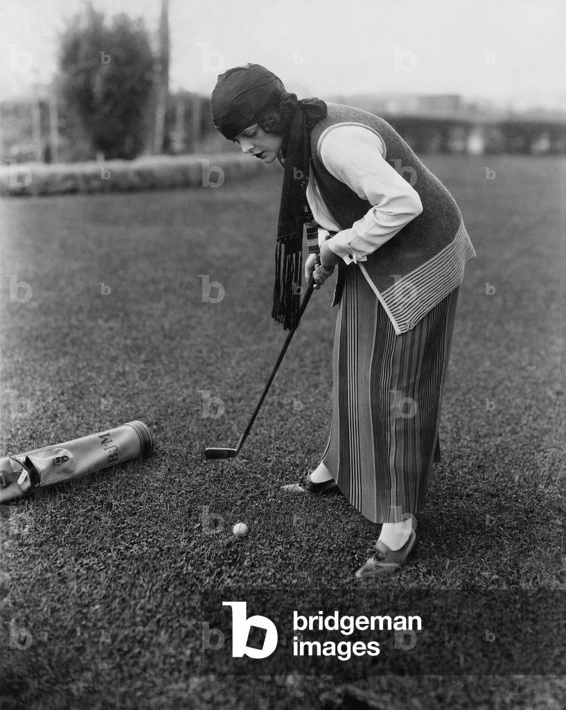 Woman Playing Golf