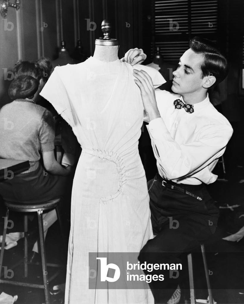 Tailor Working with Dressmakers Dummy