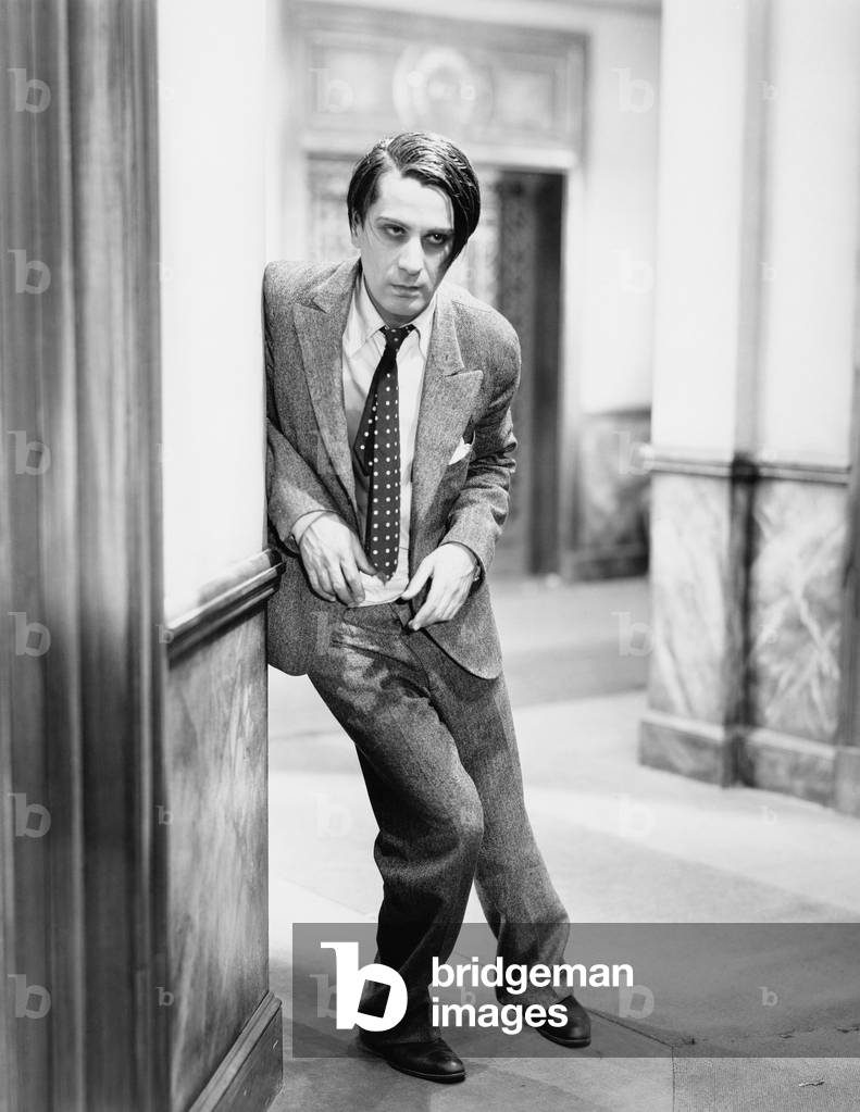 Drunk Man Leaning Against a Wall