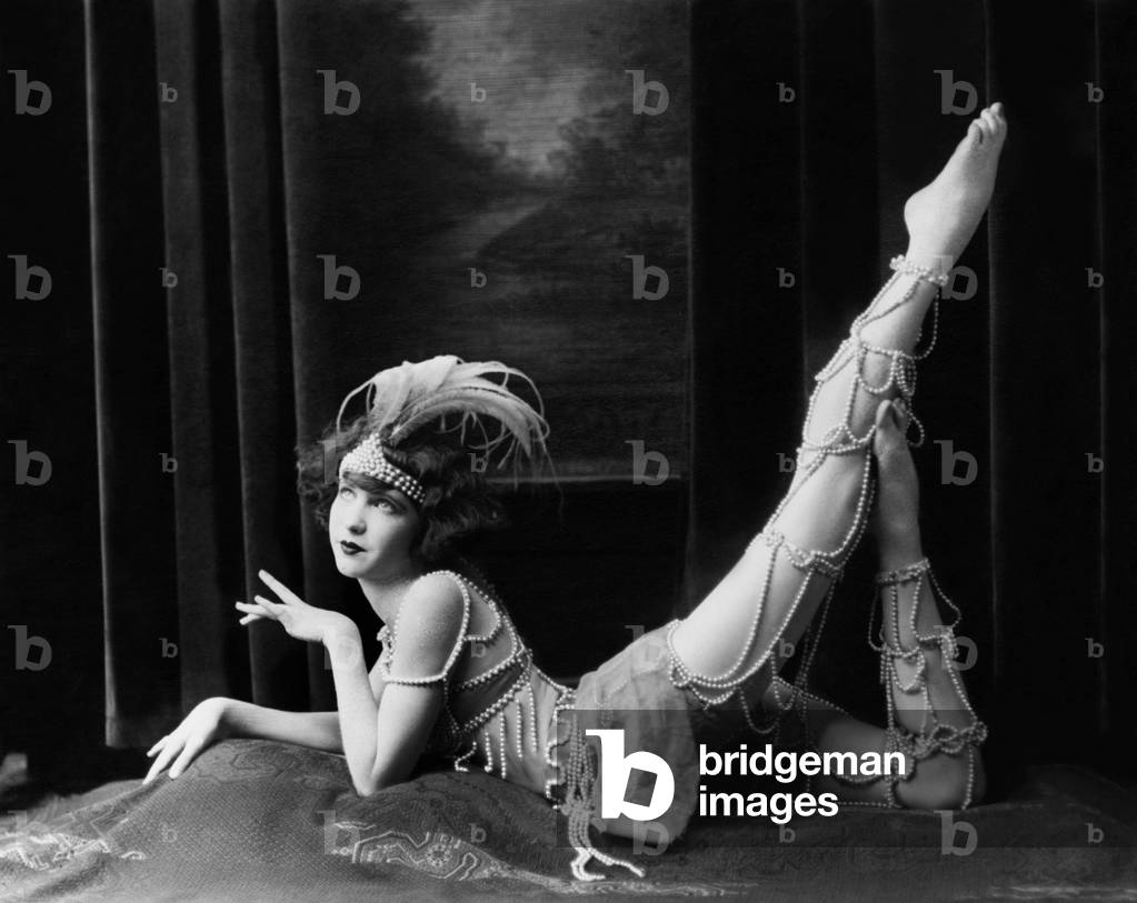 Bored Dancer Posing in Beaded Costume
