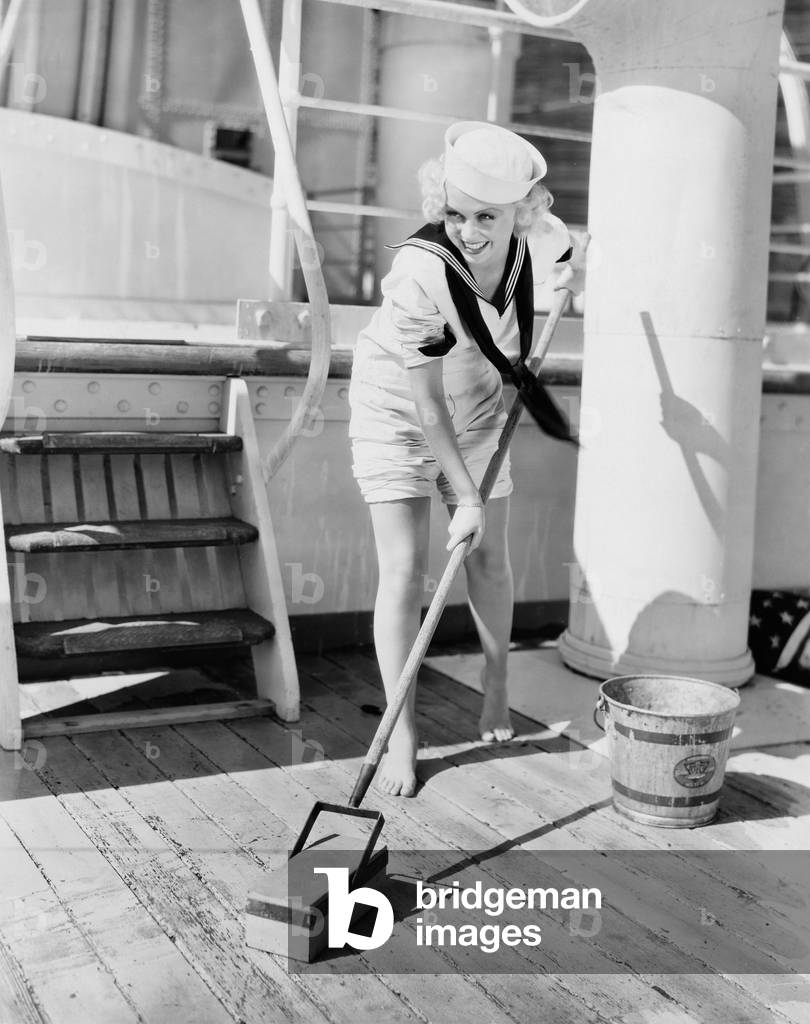 Female Sailor Swabbing Boat Deck