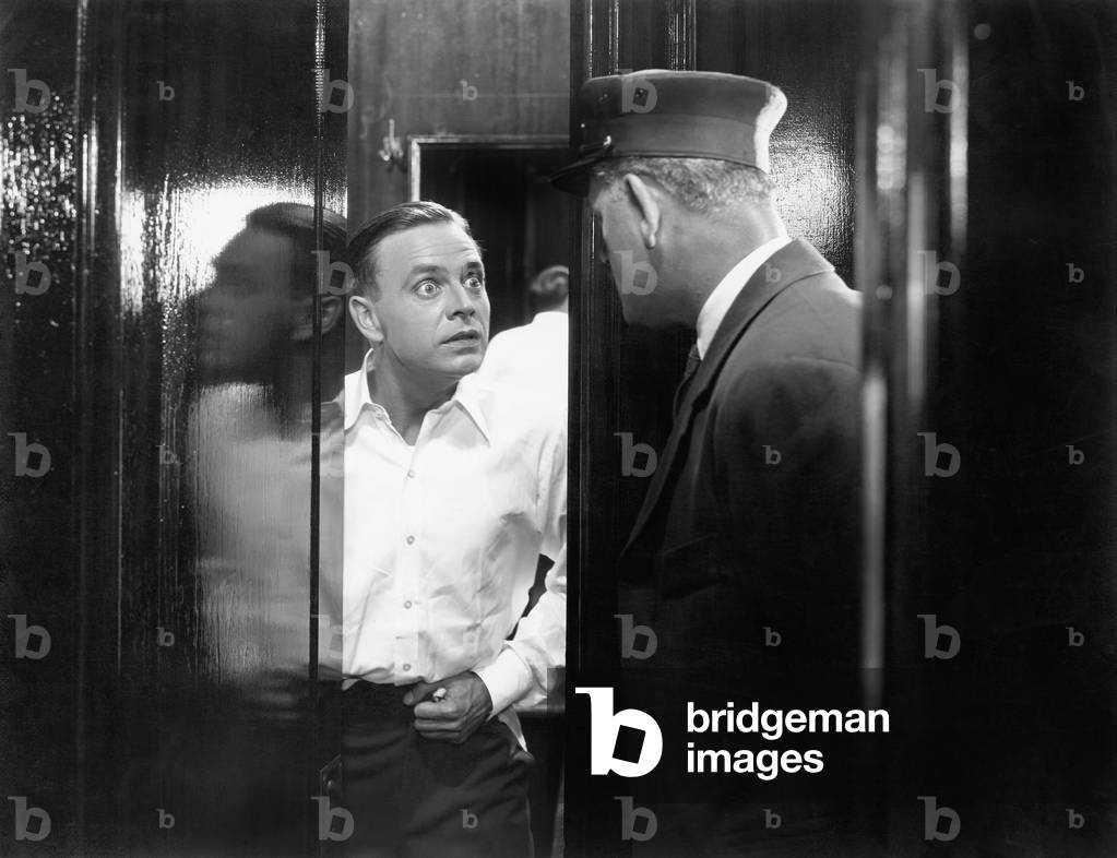 Man Opening his Door and Looking Shocked
