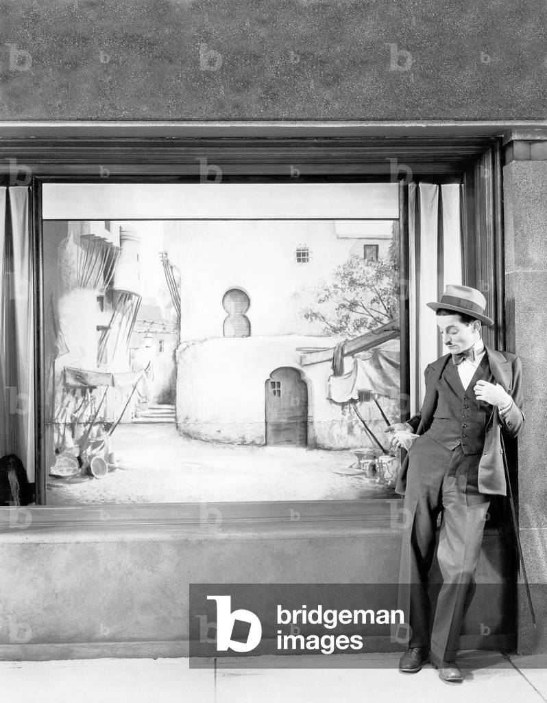 Man Standing in Front of a Store