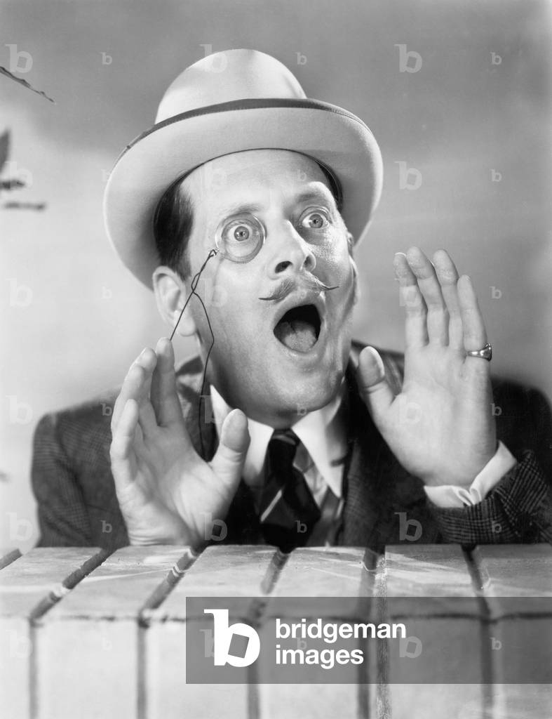 Man with a Monocle Looking Surprised