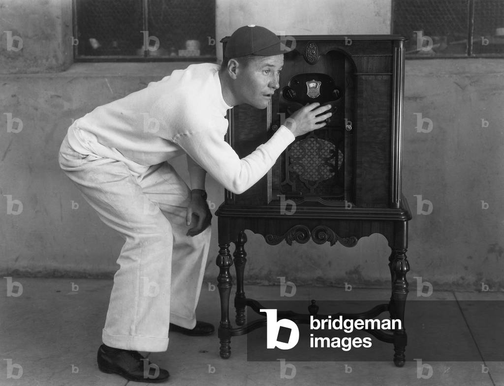 Man Listening to Radio