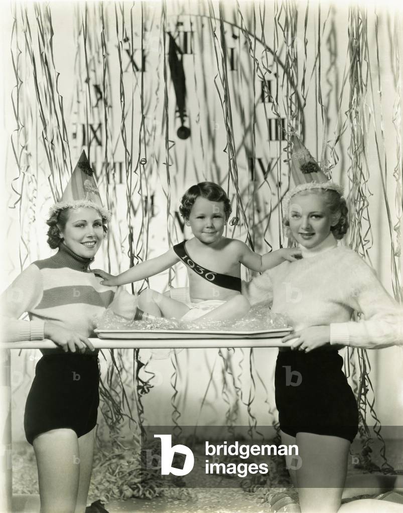 Young ladies man celebrates the New Year (b/w photo)