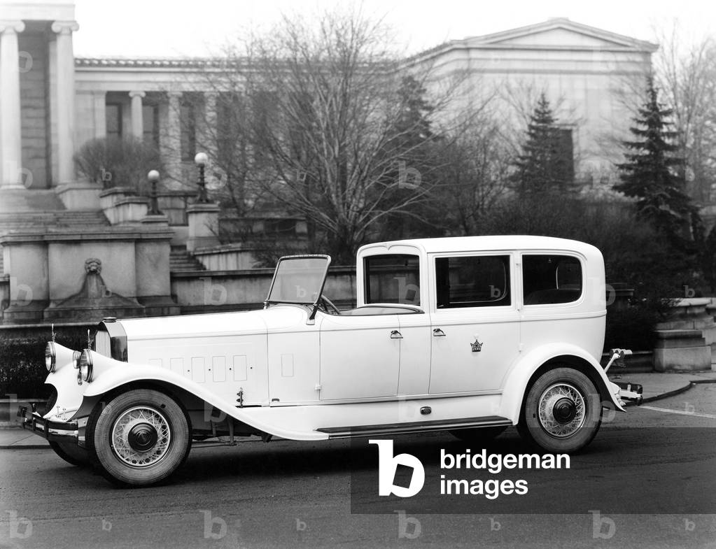 Classic Car Parked Outside Building