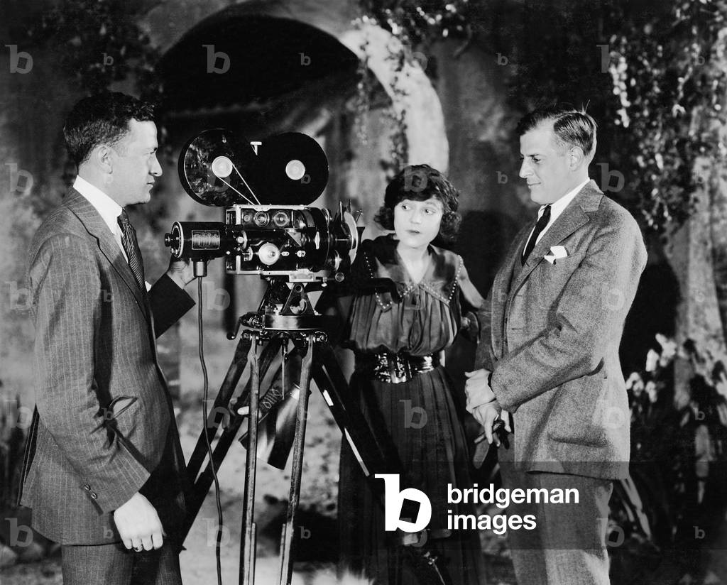 Three People with Movie Camera