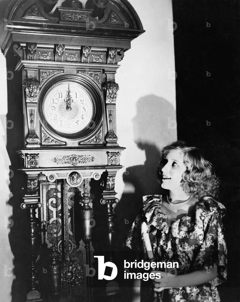 Woman with Grandfather Clock at Midnight