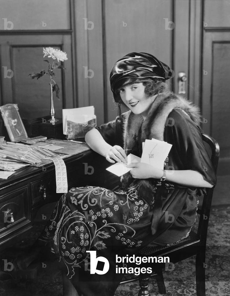 Portrait of Woman at Desk with Letters