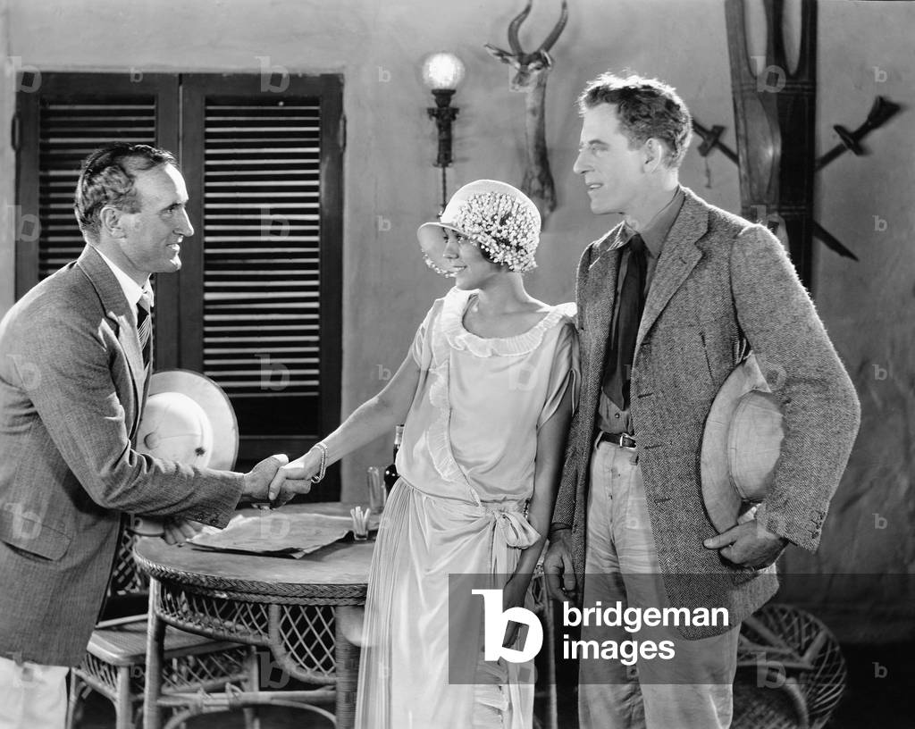 Young Man Greeting a Couple Jeune Homme Saluant Un Couple