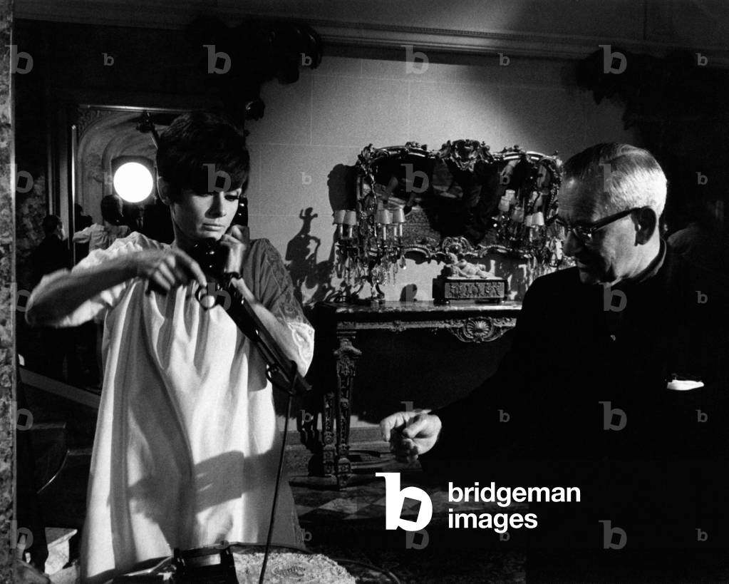 Audrey Hepburn is receiving some indications from William Wyler