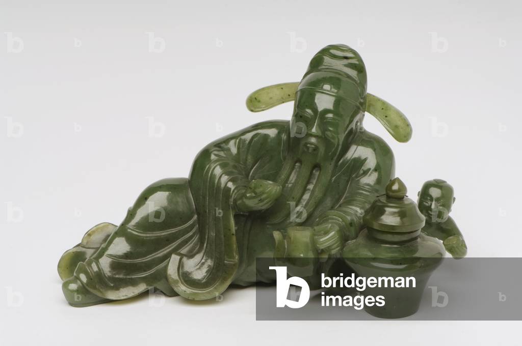 Recumbant Chinese scholar figure (jade)