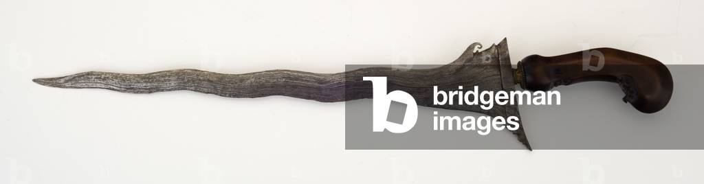 Keris, or dagger (pattern-welded steel, tayuman wood & brass)