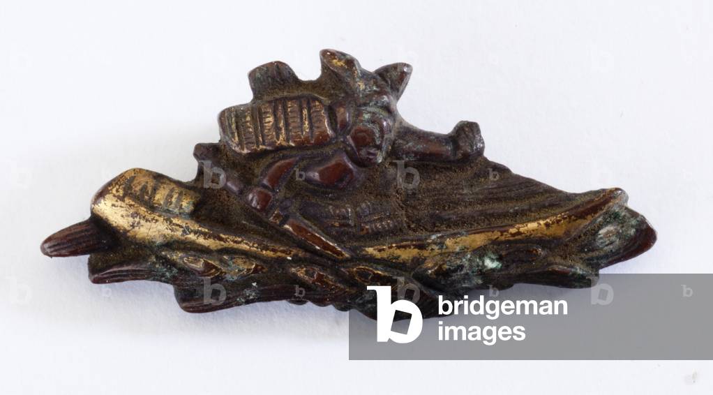 Menuki, or grip ornament, in the form of a samurai (copper-gold alloy with gilding)
