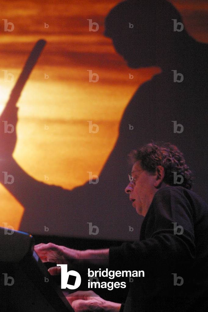Philip Glass performing the