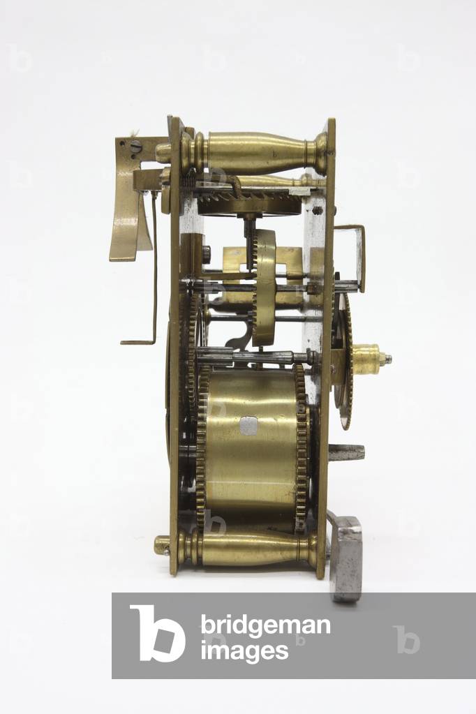 The movement, of a table clock, from the left, c. 1660 (wood & brass)