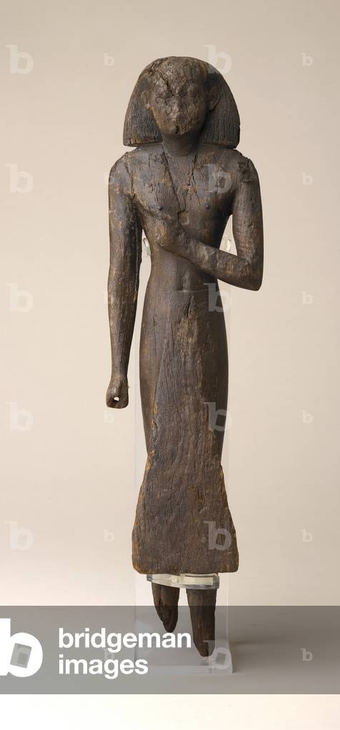 Male figure wearing a seal, from Harageh, Middle Kingdom (wood)