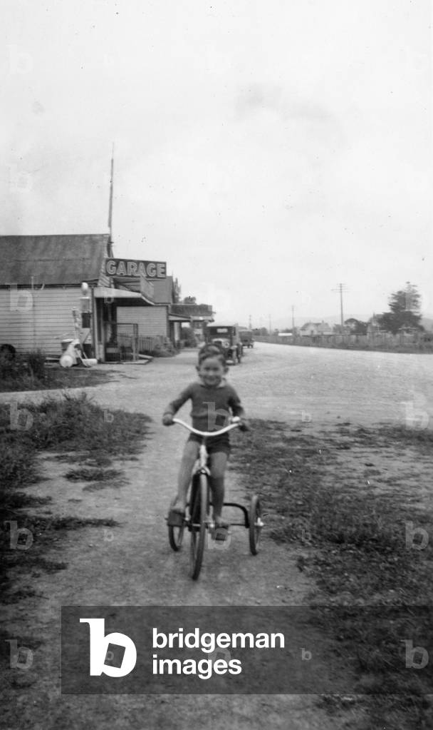 Child on South Road, on the corner of Cove Road, Waipu, 1930s (b/w photo)