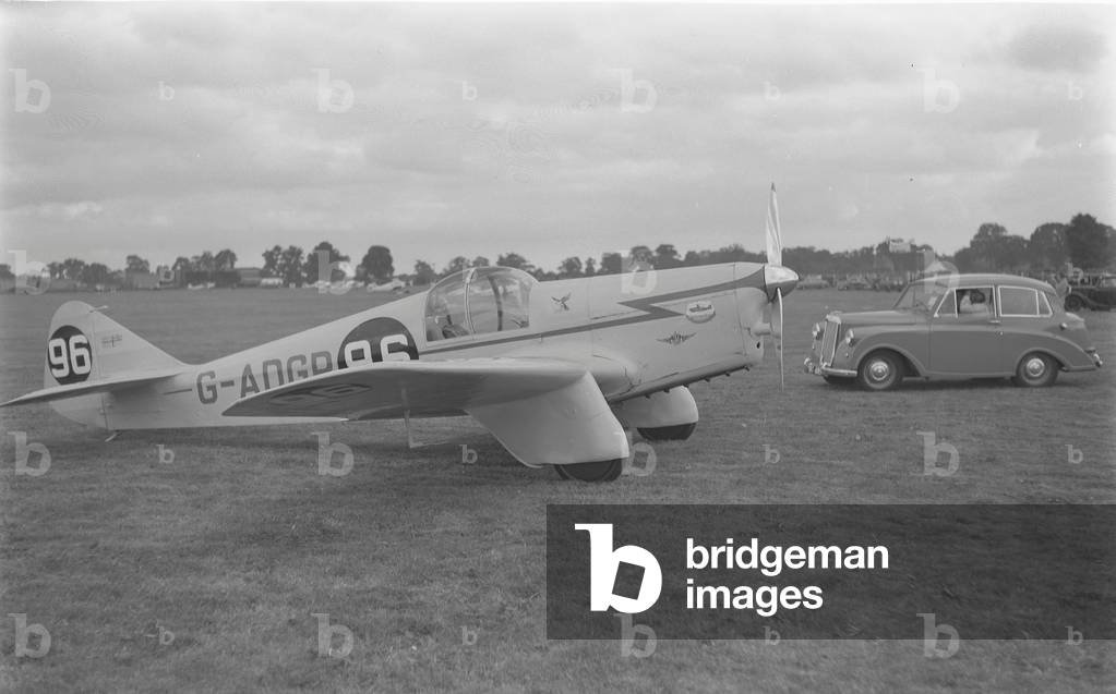 Civic Air Day at Baginton Airport, Coventry. Aircraft competing in the Armstrong Siddeley Trophy Race. Triumph Mayflower car in the background. Saturday 22 August 1953