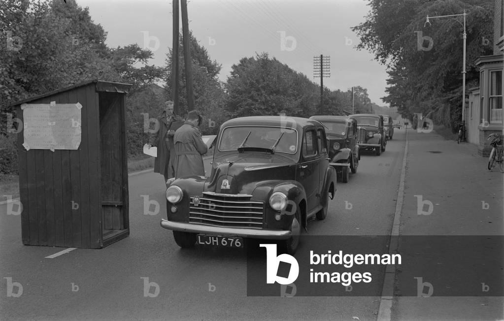 Road census on the A5, Watling Street, at Atherstone. Taken in connection with scheme for a new by-pass of the town. Queue of cars travelling north at check point. Sunday 26 August 1951