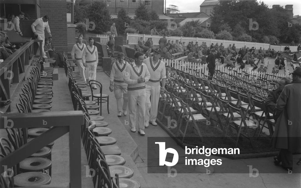 County Cricket, Warwickshire versus Nottinghamshire at the Courtaulds Ground, Lockhurst Lane, Coventry. W. Sime (Notts captain) leads out his team. Thursday 17 August 1950.