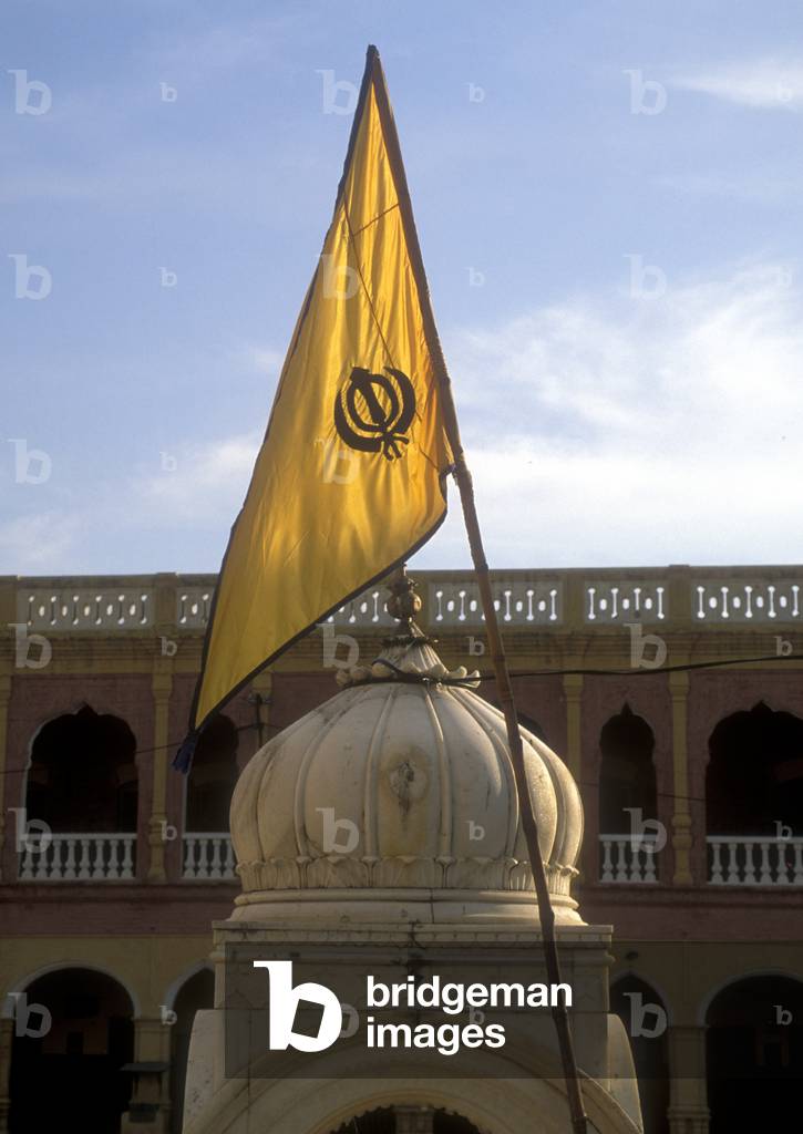 Sikh flag flying over Pancha Sahib Gurdwara, Pakistan (photo)