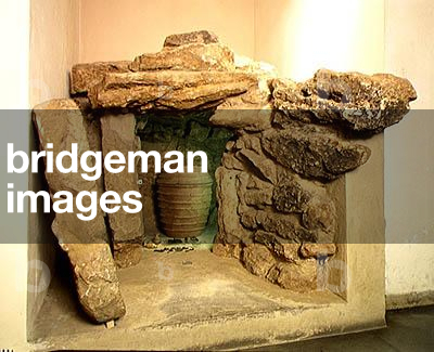 Reconstruction of an Etruscan tomb with an urn (stone)