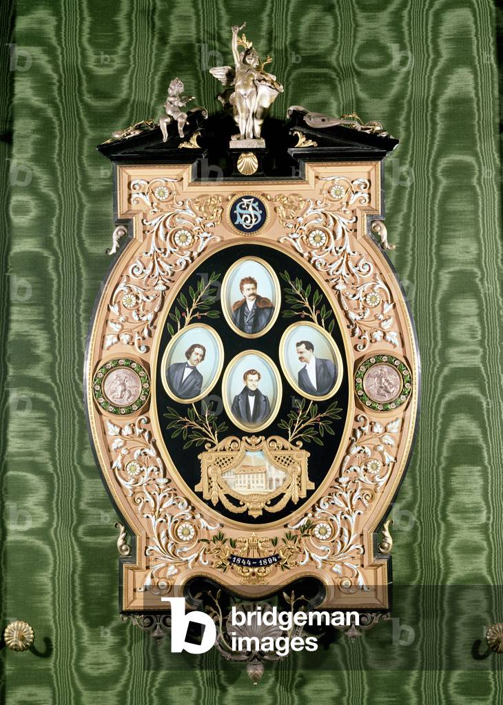 Tableau of four miniatures depicting members of the Strauss family: LtoR, TtoB Johann Strauss the Younger (1825-99), Eduard Strauss, Joseph Strauss, Johann Strauss the Elder (1804-49) with the birthplace of Johann Strauss the Younger below, 1894 (w/c on ivory, framework of gilt and enamelled pearwood)
