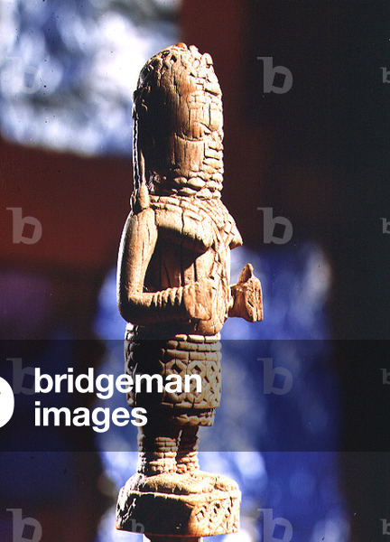 Figurine of a female attendant of a Queen mother, Benin (ivory)