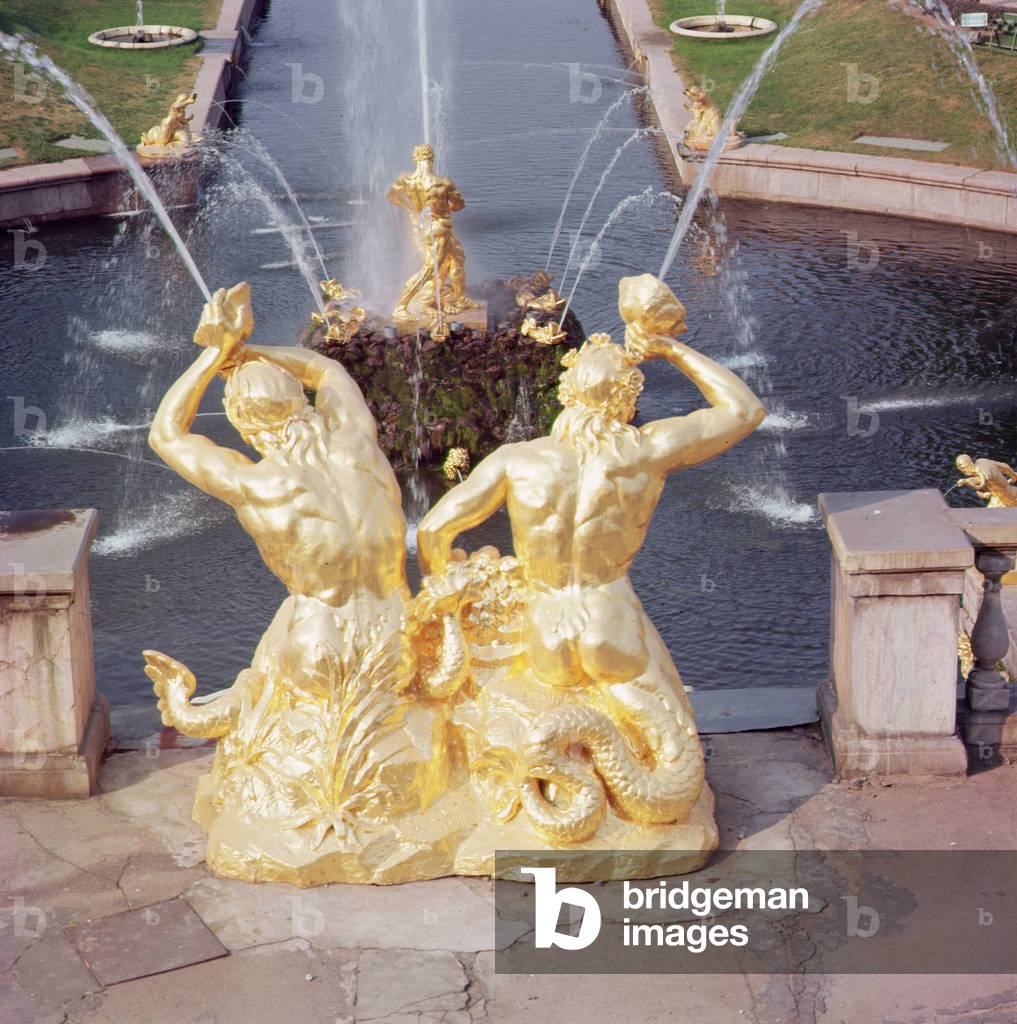 Sculptural group of two gilded tritons from the Grand Cascade, begun 1710 (photo)