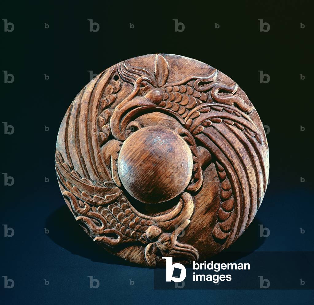 Roundel decorated with two griffins, Altai nomadic (wood)