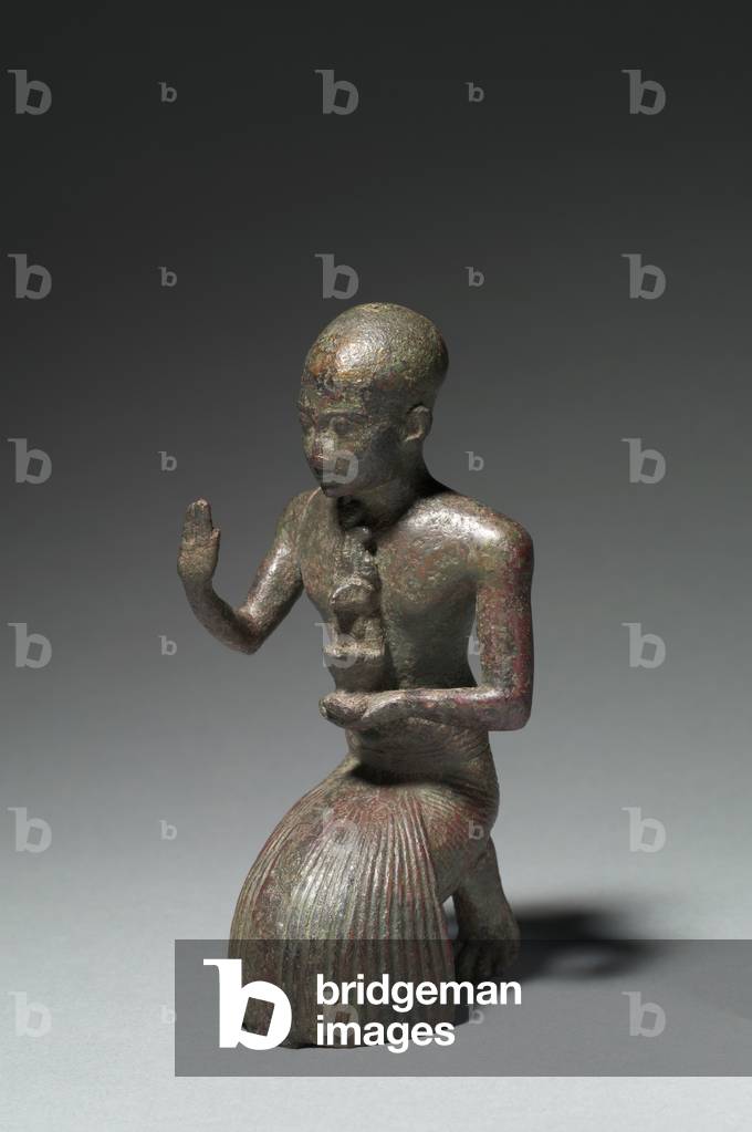 Statuette of a Kneeling Priest, 1186-1069 BC (tin-bronze alloy, probably leaded, hollow cast) 
