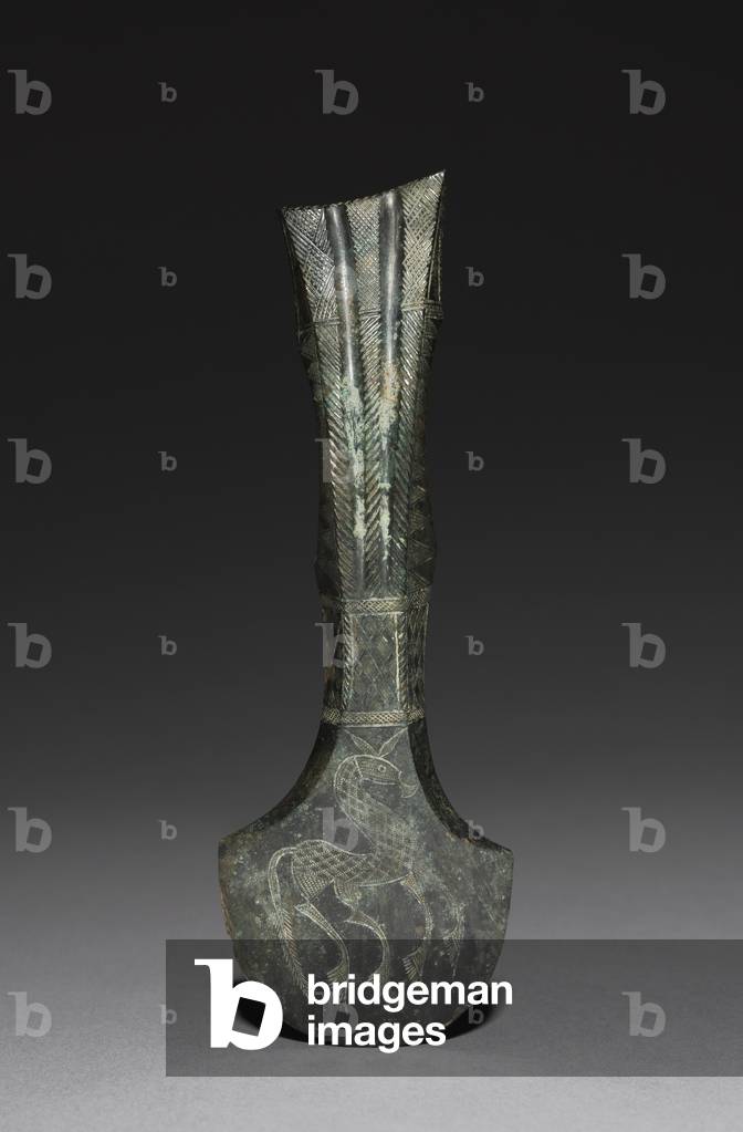Axe Head, 900-600 BC (bronze, cast in bi-part mold, polished, incised, and chased) 
