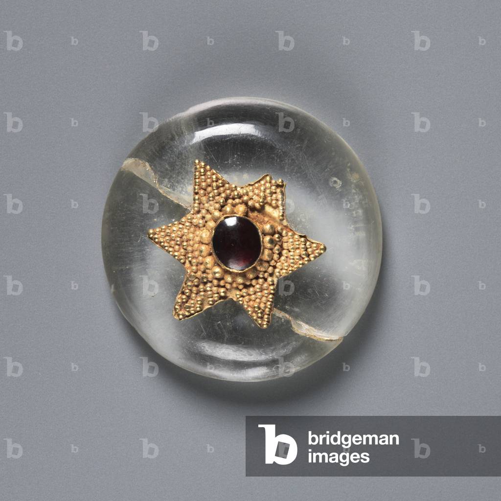 Button, 500s (rock crystal with a garnet mounted in a gold granulated star)