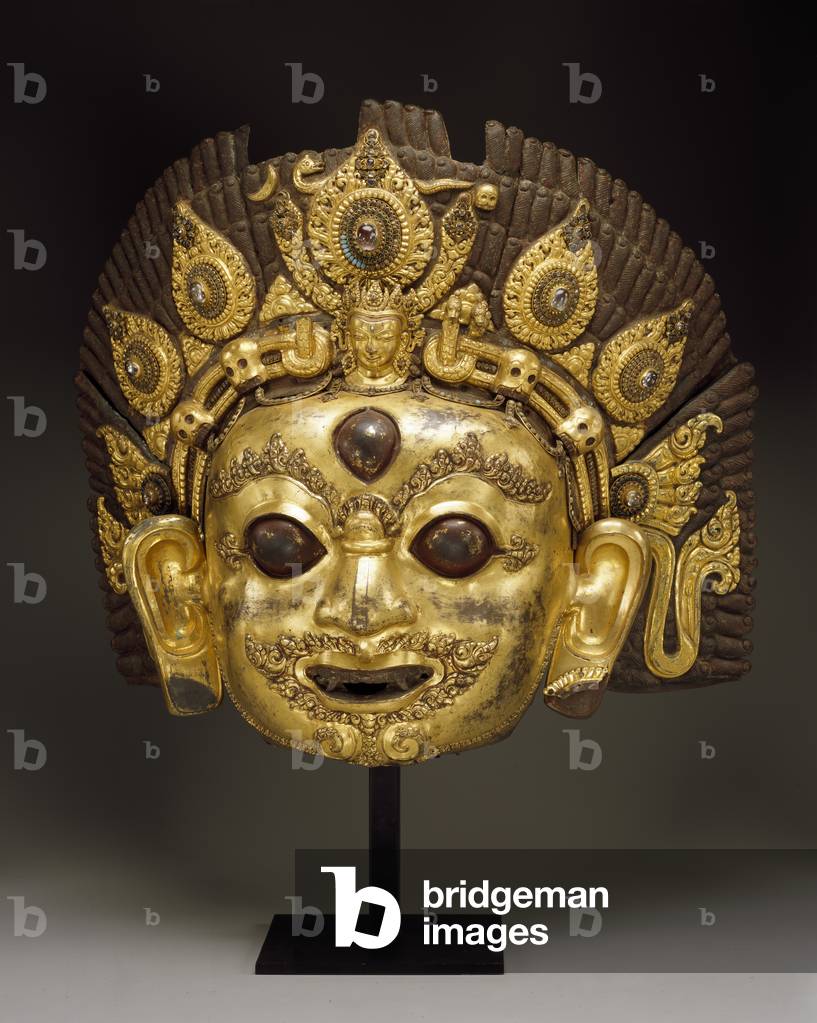 Mask of Bhairava (gilt copper repoussé & gemstones)