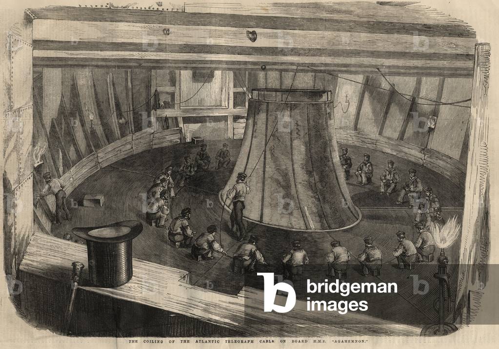 Telegraphy: the winding of the transatlantic cable on board the ship H.M.S. “” Agamemnon”””. Engraving in “” The illustrated London News”” of August 1, 1857.