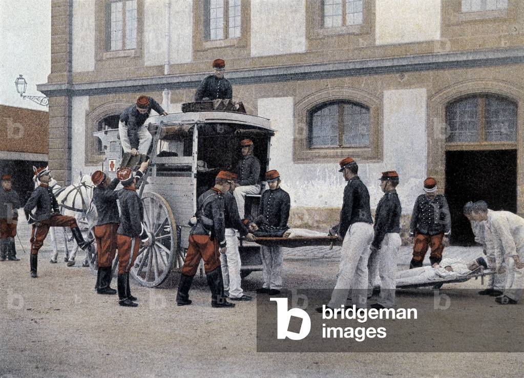 Loading the wounded in an ambulance - in “” Military Album”” - Crew Train, 1892.