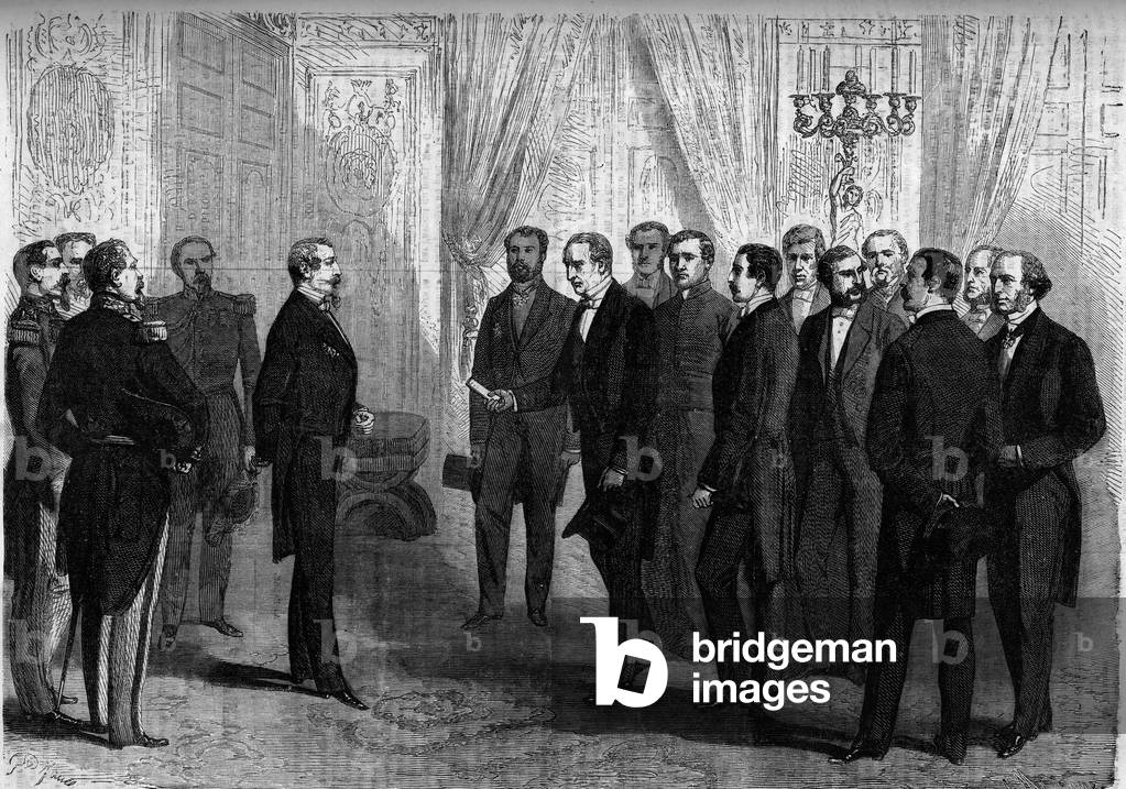 L'empereur Napoleon III recoit aux Tuileries la delegation mexicaine chargee d'offrir la couronne du Mexique au prince Maximilien (Maximilien 1er du Mexique). Paris, 1863. A gauche, Napoleon III (1808-1873). Derriere lui, le general de Beville. Face a eux, les representants mexicains : J. Hidalgo, Gutierrez de Estrada, Escandon, P. Miranda, Iglesias, Velasquez de Leon, le comte del Valle, Aguilar, Landa, M. d'Arrangoiz et le general Woll. Gravure in 