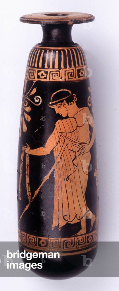 Second part: Alabaster perfume vase with red figures depicting a young groom tending a belt, symbol of the union of the couple, to the young woman. 470 BC