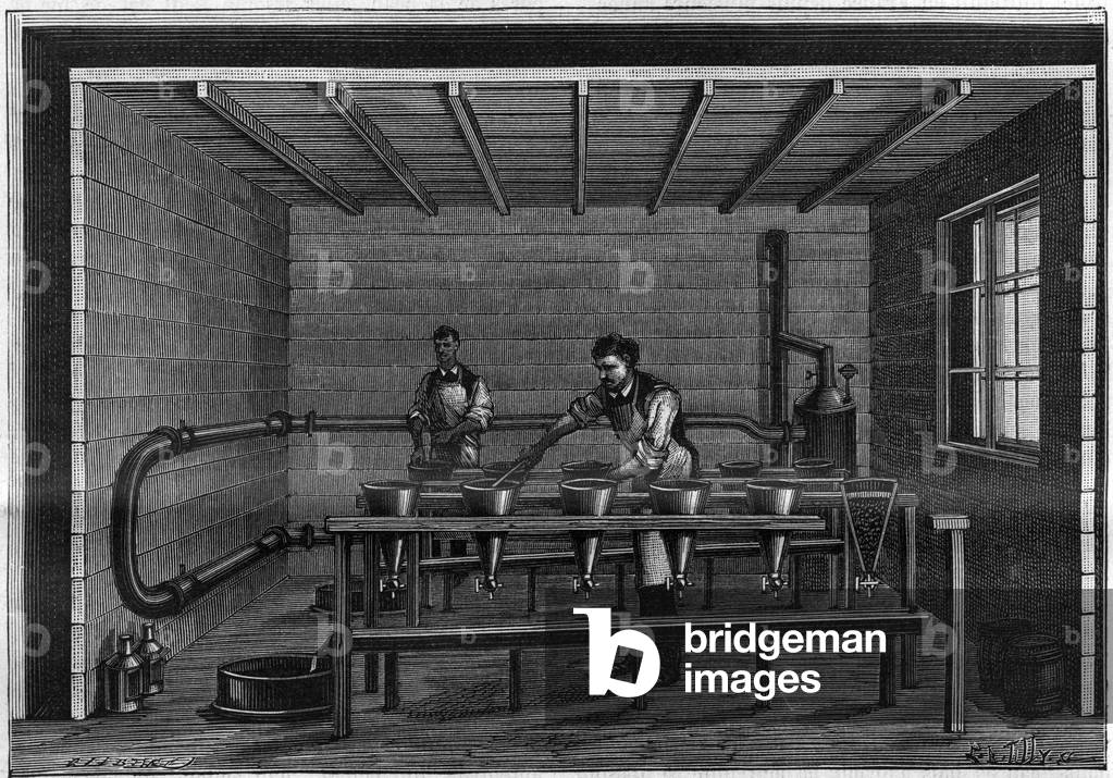 Manufacture of Vaseline. Arrangement of a filtration unit on the black animal. Engraving from 1885.